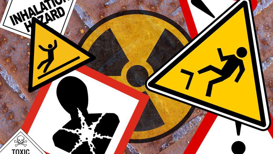 hazard sign on metal background