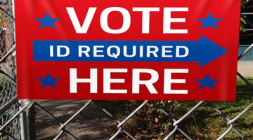 Vote Here - ID Required sign