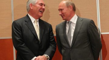 Rex Tillerson of Exxon jokes with Vladmir Putin