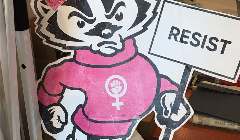 Pink Bucky with 'Resist' sign